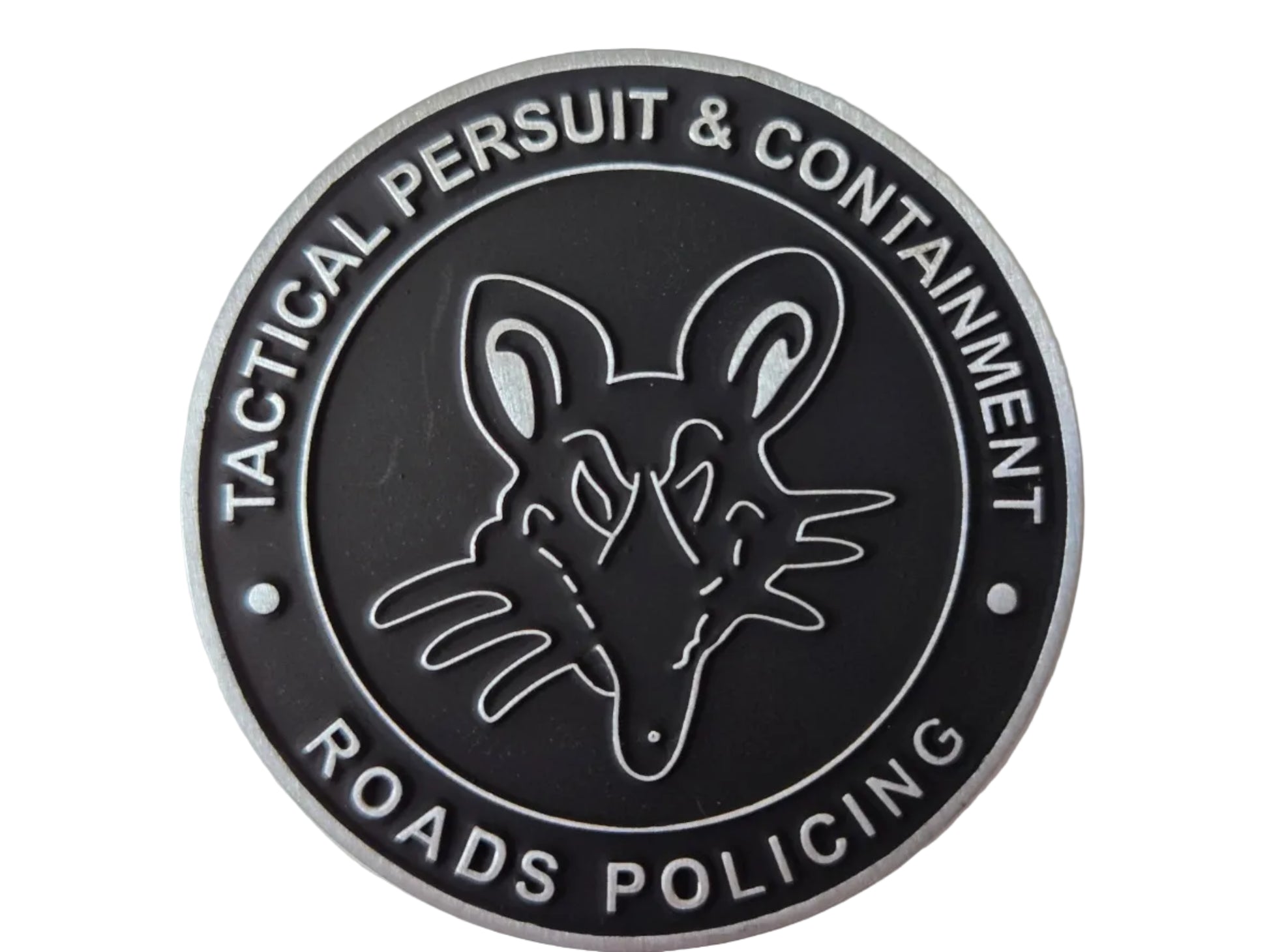 A circular black and silver tactical patch featuring a stylized mouse head emblem in the center, with the text 'TACTICAL PERSUIT & CONTAINMENT' and 'ROADS POLICING' around the border.